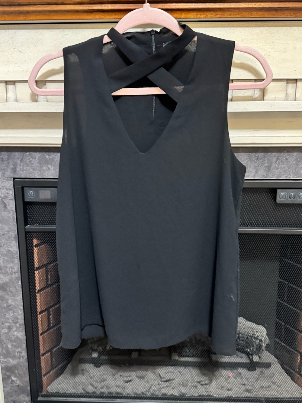 Black Sleeveless Crisscross Neck Blouse